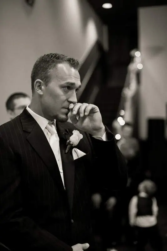 Photo of groom's reaction to bride entering