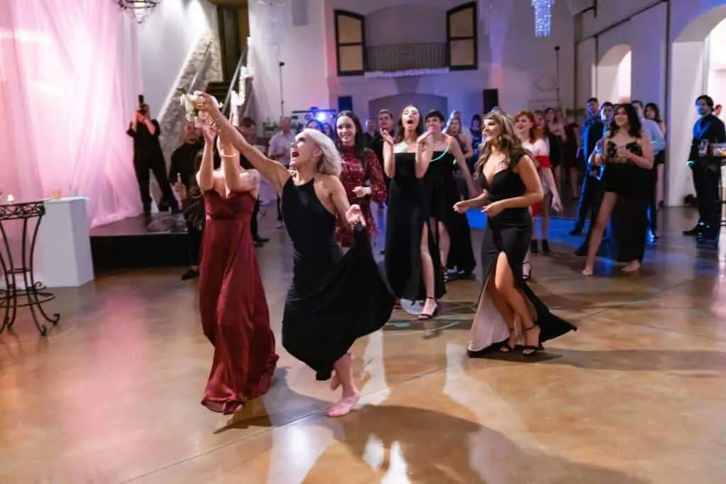Bouquet toss bridesmaids fight