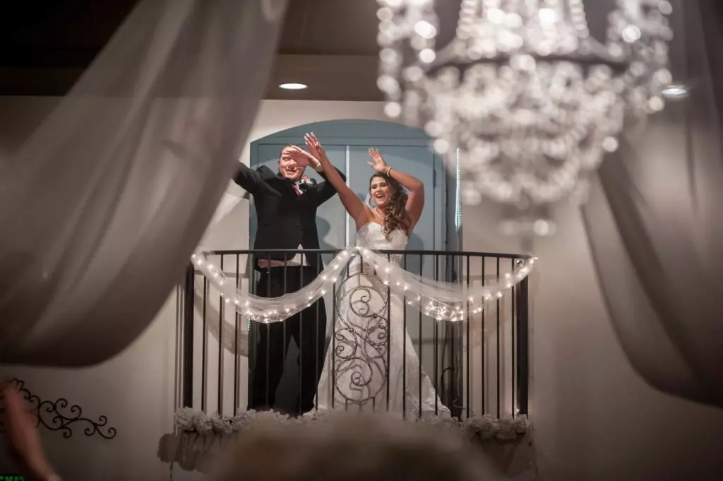 All-inclusive Denver Wedding Venue - Bride and groom on balcony