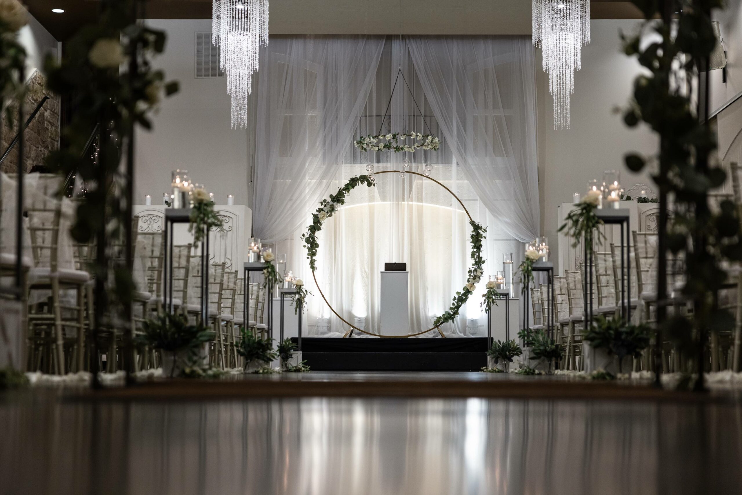 The Ultimate Wedding Ceremony Checklist - Ceremony Ring backdrop with Greenery and Candles down the Aisle 
