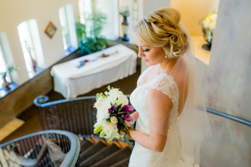 A girl and her wedding dress - bride on stairs