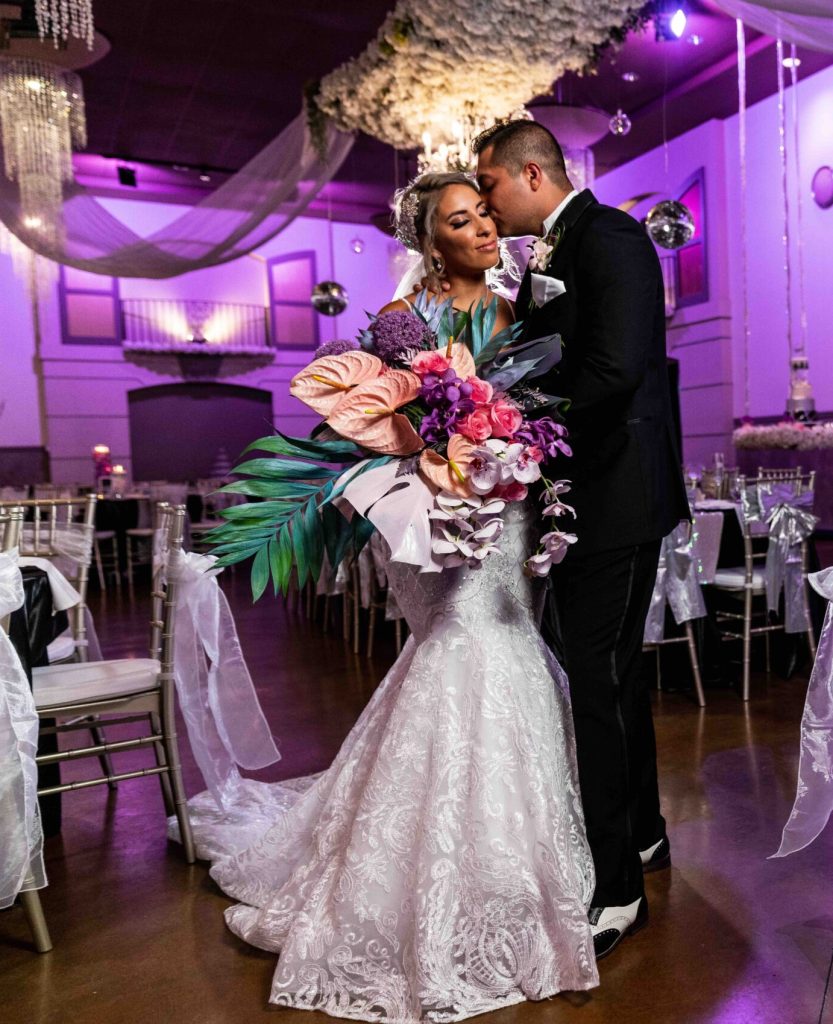 Purple wedding lighting at Colorado wedding venue