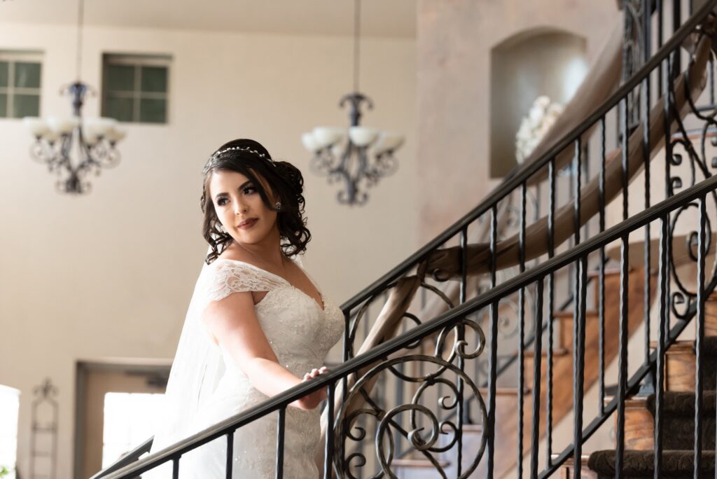 Bridal gown on grand staircase with stunning bride