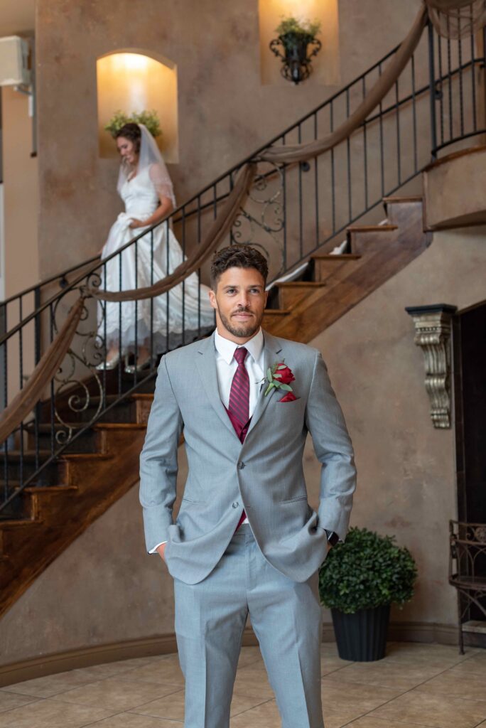 Bride and groom first look on staircase