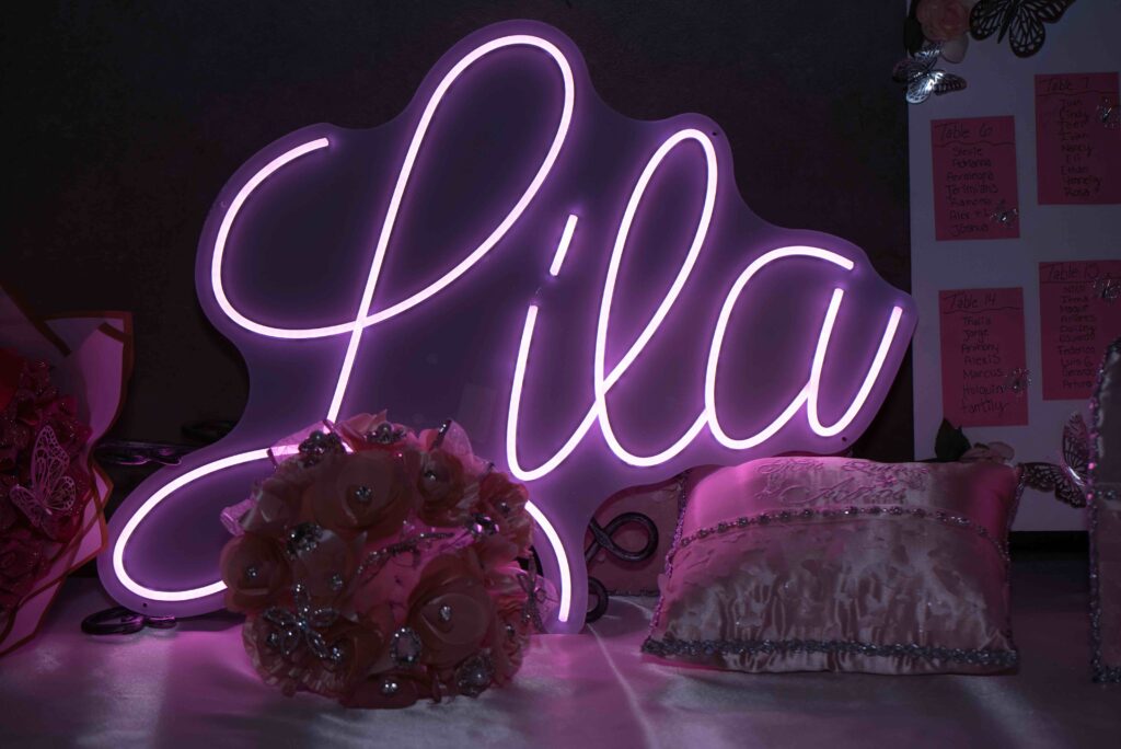 Quinceañera Venues: Light Pink Theme with neon sign