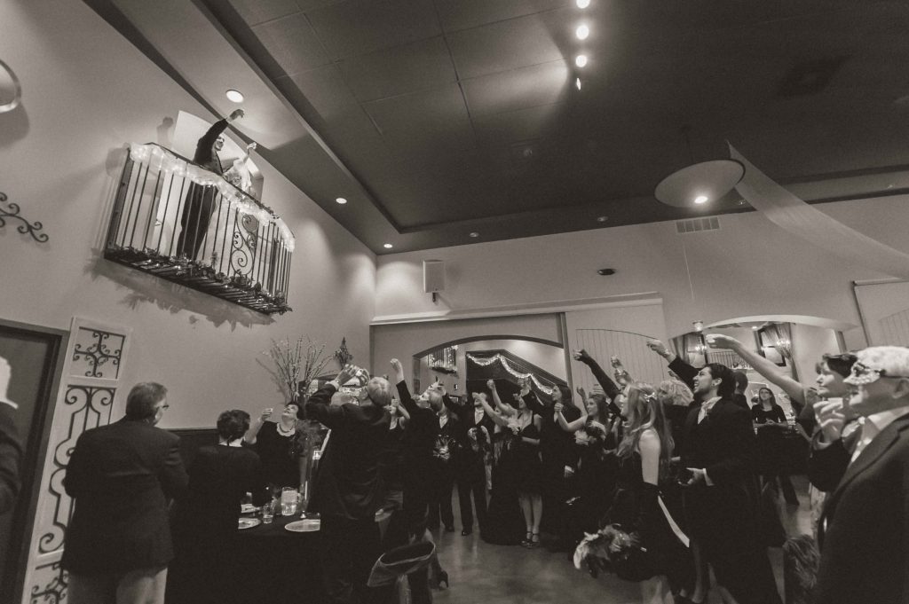 Wedding toast off balcony 