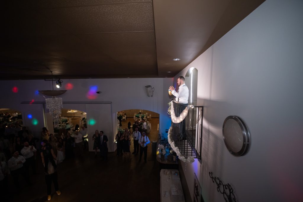 Garter toss off balcony